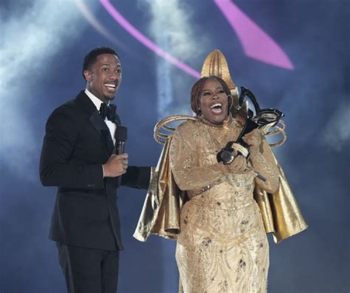 
Fans Are Convinced Amber Riley Is Harp In Masked Singer As Family Details Are Revealed 