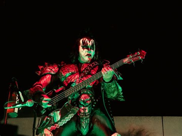 What degree does Gene Simmons have? What instrument did Gene Simmons play?